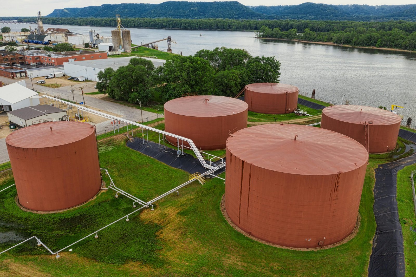 Aerial shot of fuel storage tanks by the Mississippi River in Winona, Minnesota.